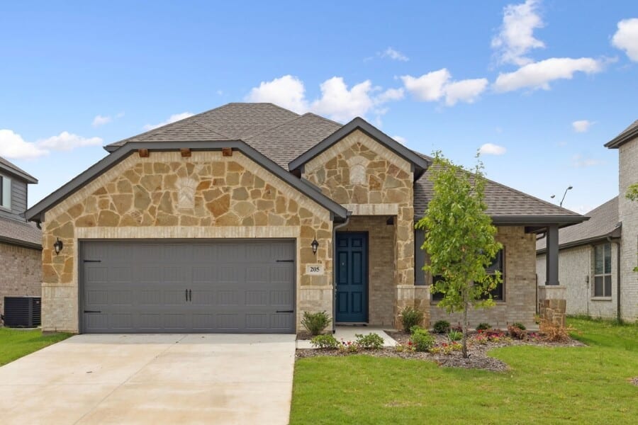 Single-story suburban home with stone facade and attached two-car garage.